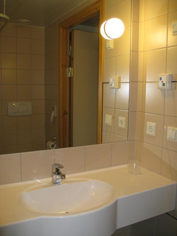 Unicare Roros Hotel Kamer foto